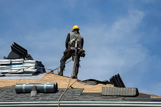 Professional Gutter Installation technician working in Berryville, AR